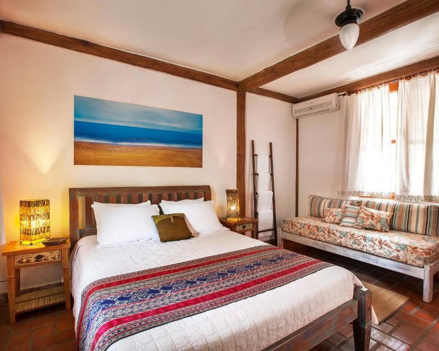 Suíte Térrea Família - Pousada Reserva Camburi